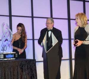Ms. Tapken reacts to the unveiling of her 40-year award!